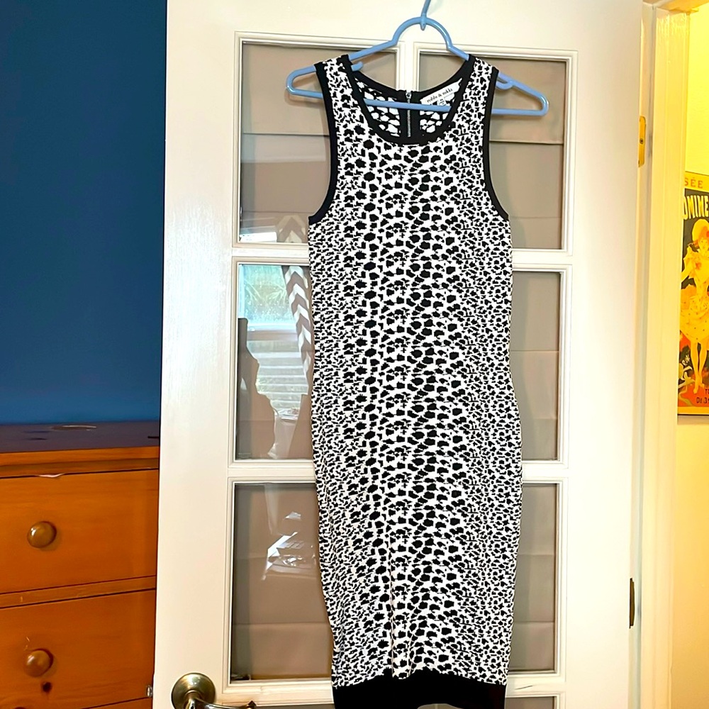 Cocktail dress with beautiful zip back. Never been worn.